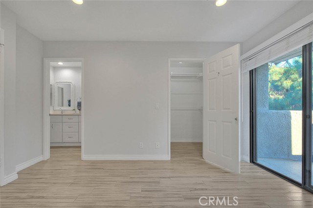 Primary Bedroom features a walk-in closet