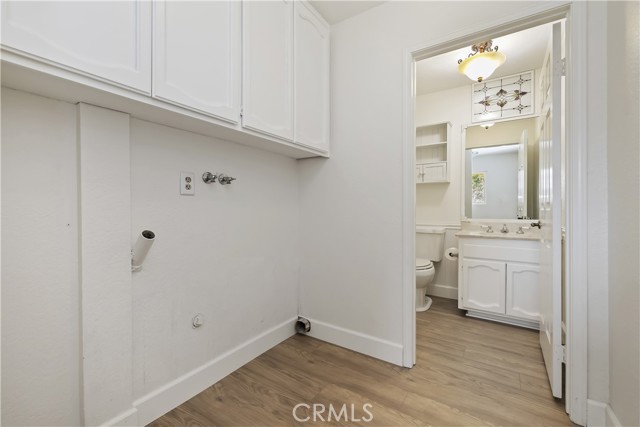 Laundry Room area with 1/2 bath used as mudroom