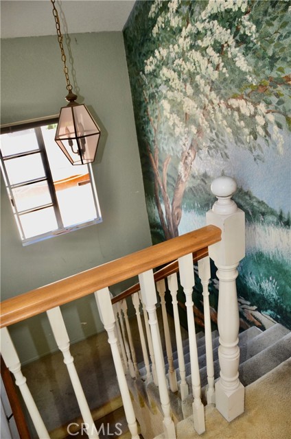 Dramatic high ceilings above staircase