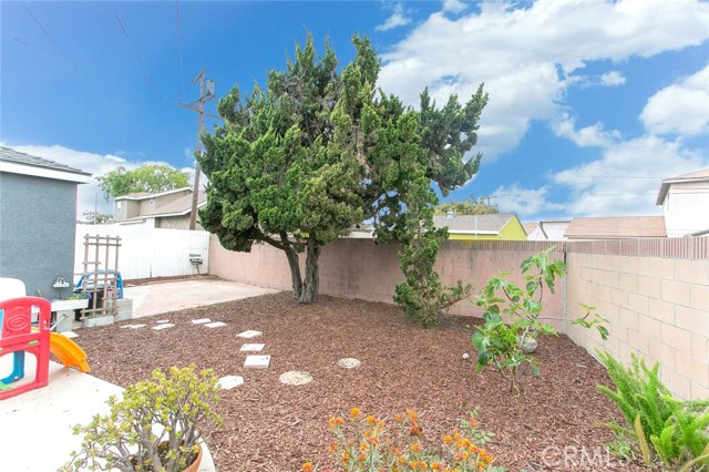 Fenced and semi-covered Patio and Backyard is perfect for family gatherings and playground for kids.