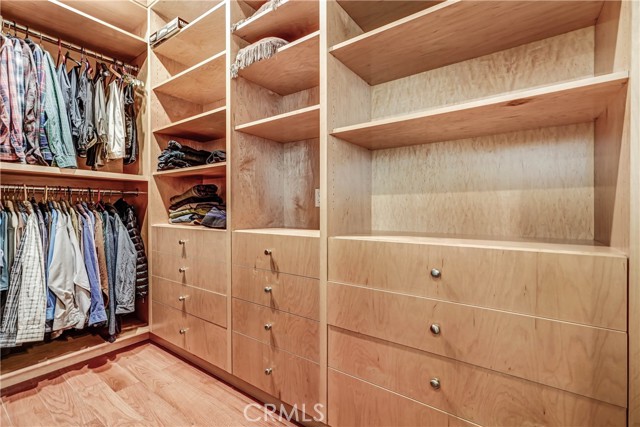 walk in , organized master closet