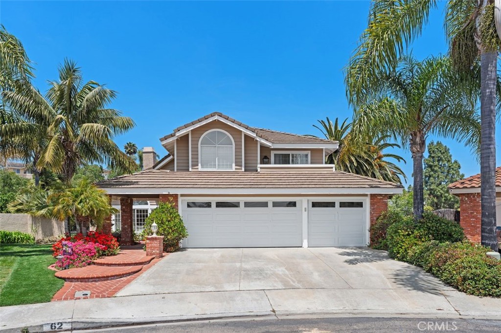 Welcome home to the highly desirable neighborhood of The Palisades in Laguna Niguel.  As you step inside this stunning home you are greeted by a formal living room with volume ceilings. To the right is a spacious office/bedroom with a custom Murphy bed.  This beautiful home with coastal elegance has been tastefully upgraded inside and out and is nestled in a private cul-de-sac with no backing neighbor.  This estate is the staple of private living in a peaceful community. A total of 5 bedrooms, two on the first level, and 3 up. Three fireplaces including two new linear fire & ice electric fireplaces add modern ambiance. The additional square footage added give you a downstairs private bedroom and bath. Expanded kitchen with an abundance of upgrades including all new cabinets, quartz countertops, porcelain flooring and high end kitchen appliances; Bosch refrigerator and range, Miele Oven & Dishwasher, and Viking Microwave. Plantation shutters throughout, New wood floors and new plumbing with PEX piping. Upgraded staircase with cutaway banisters. All bathrooms have been remodeled and master includes custom built-in cabinets in closets. Recessed lighting throughout, new ceiling fans, and Dual Zone A/C and heating for entire house, A SOLAR OWNED SYSTEM THE BACKYARD is an ENTERTAINERS DREAM WITH YOUR VERY OWN EXPANSIVE CUSTOM PUTTING GREEN, with brick pavers, a large built-in BBQ, custom outdoor fireplace, a large fountain, and also includes mature Canary Island Day Palms, upgraded lighting and large side yard for extra entertaining. The Palisades known for its generous lots, low HOA and wide streets, top tier schools also offers nature trails that go all the way to Salt Creek Beach, tunneled for ease of crossing.  Only 3.5 miles from the newly renovated Downtown Dana Point, renown resorts, beautiful beaches and close proximity to Monarch Beach Resort/Spa and The Ritz Carlton!