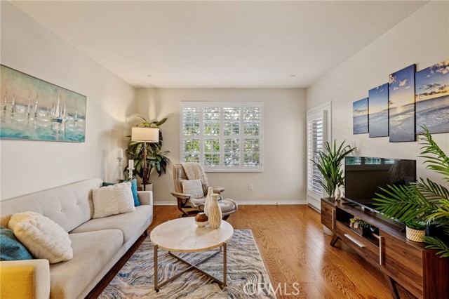 Wood shutters add style and value to living area.