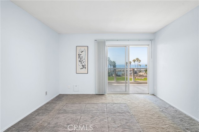 Bedroom with doors to the balcony