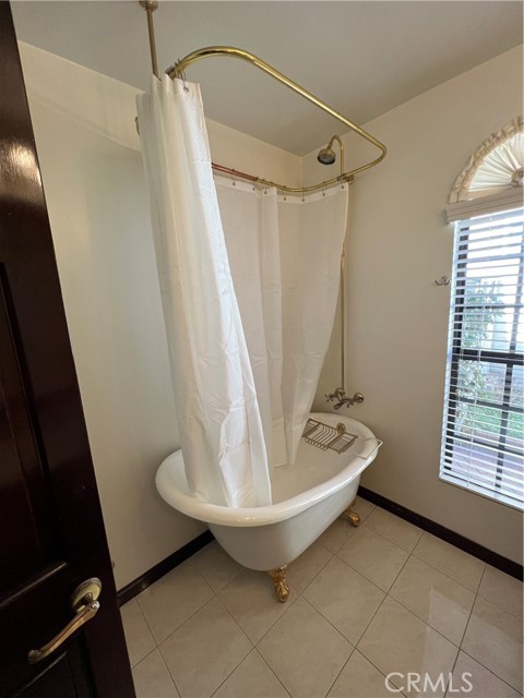 Downstairs hallway bath with claw tub/shower