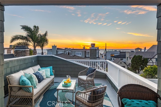 Enjoy incredible sunsets from the very private top floor ocean view deck