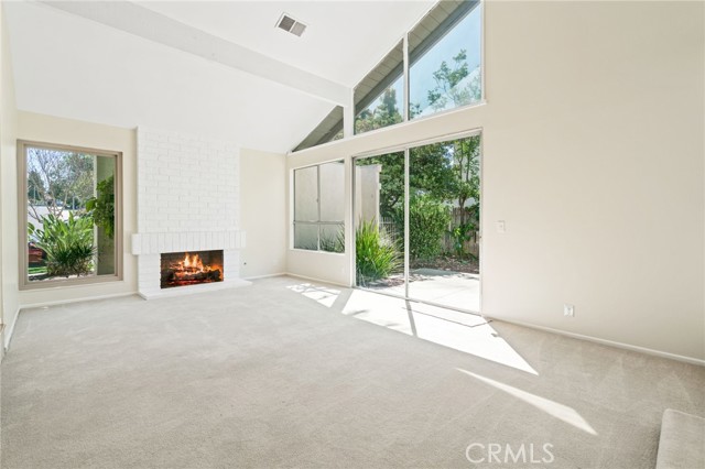 Living Room w/fireplace. Full of Light