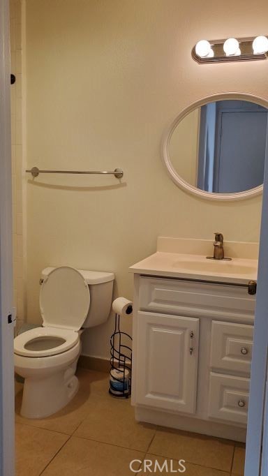 Bathroom with tile flooring