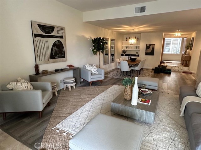 ENTRY, LIVING ROOM AND FAMILY ROOM