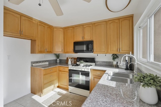 Wood Cabinetry & Solid Counter Top