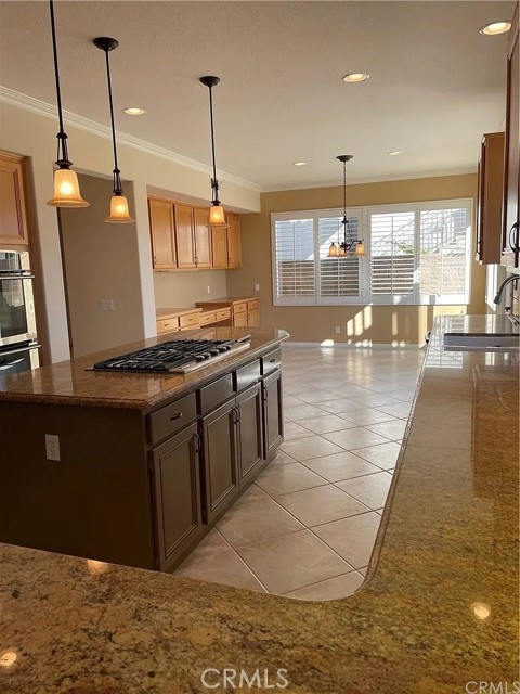 Solid surface counter top and island cooktop