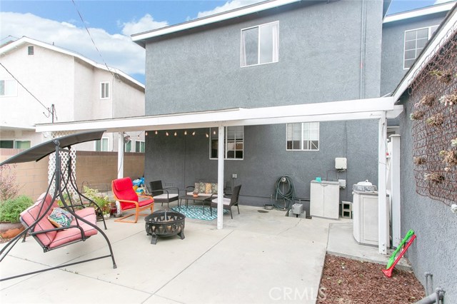 Fenced and semi-covered Patio and Backyard is perfect for family gatherings and playground for kids.