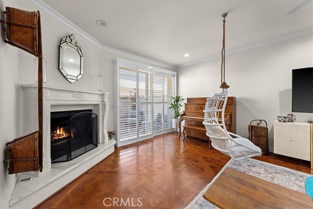 Marble fireplace, plantation shutters to patio