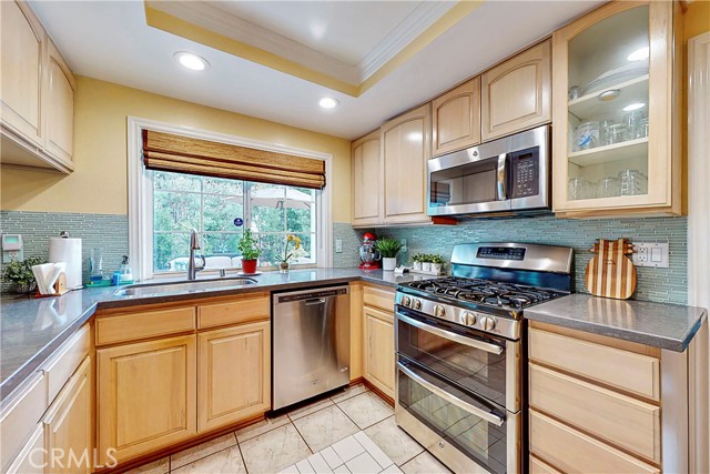 Kitchen with recessed lighting and quartz counertop