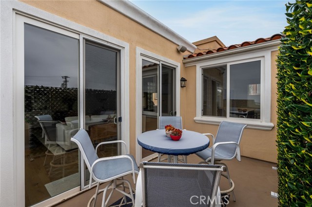 Outdoor patio off living room perfect for outdoor dining