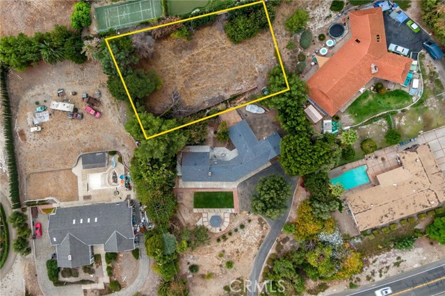 The circular driveway can hold several cars at once.