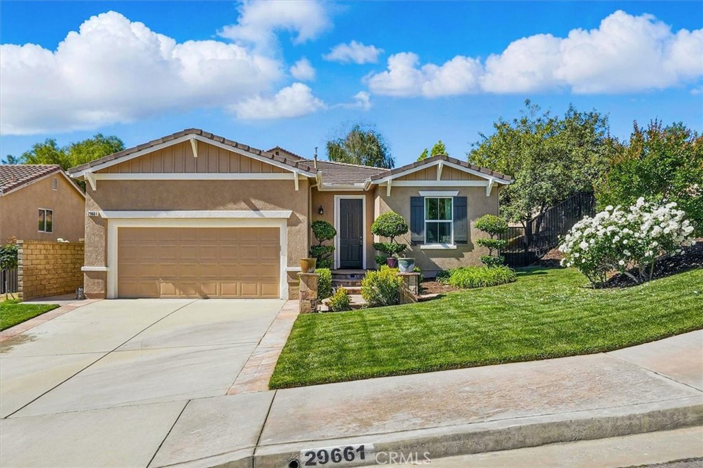 Charming Single-Story Home in Castaic's Hasley Hills!
Welcome to 29661 Cambridge Dr, a beautifully maintained 3-bedroom, 2-bathroom home located in the desirable Hasley Hills neighborhood of Castaic. Newly upgraded with interior and exterior paint. This property boasts an inviting open-concept layout, perfect for modern living. The kitchen features sleek tile countertops, ample cabinetry, a pantry, and stainless steel appliances, seamlessly flowing into the spacious family room and dining area. From the kitchen step down to the large 2 car garage featuring tons of storage!

The primary suite offers a serene retreat with high ceilings and a luxurious en-suite bathroom, complete with dual sinks and a stunning glass-enclosed walk-in shower. Two additional bedrooms share a well-appointed secondary bathroom, providing plenty of space for family or guests.

Step outside to enjoy the expansive backyard, featuring stamped concrete, a built-in BBQ and a generous side yard—ideal for entertaining or relaxing.

This home is conveniently located near shopping centers, top-rated schools, restaurants, Castaic Lake, and recreational facilities, with easy access to the freeway.