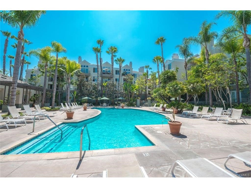 Resort-style living in the heart of Irvine at the guard-gated community, The Metropolitan Condominiums. This PENTHOUSE CONDO is a one-bedroom & versatile den/office/second bedroom and one bathroom. This property rarely comes out on the market and is COMPLETELY REMODELED - New custom painting throughout the home, New cabinets, and New granite countertops in the kitchen and bathroom, New designer carpet, and New flooring, and much more to mention. The features include 13 FOOT SOARING CEILING in the living room. Master bedroom with walk-in closet and direct access to the balcony. The Master bathroom has A SOARING SKYLIGHT and a roman style soaking bathtub with a separate walk-in shower, Quality appliances with disposal, Washer and dryer, Crown and base moldings, Subterranean 2 parking spaces side by side. Beautiful pool & spa, lush landscaping, a gym, and a clubhouse. Centrally located close to South Coast Plaza, Fashion Island, beaches, freeways 405, 73, 55, and John Wayne airport. This home is turn-key!!! A must-see!!!