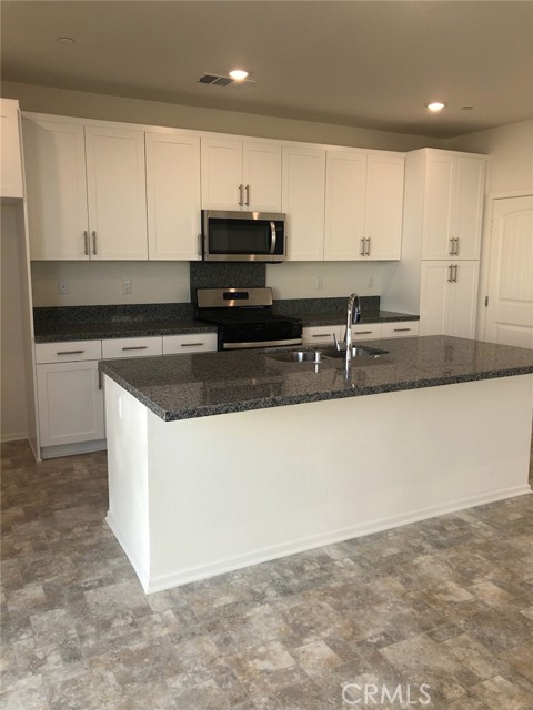 Large Kitchen Island
S/S Appliances