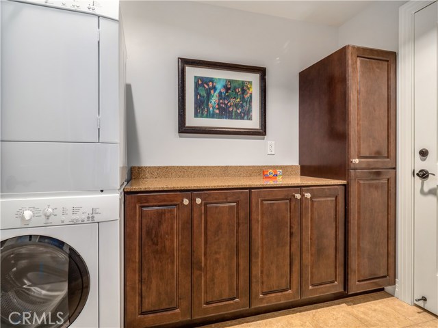 The laundry room leads to the locked owner's closet where owners may leave their belongings in between stays.