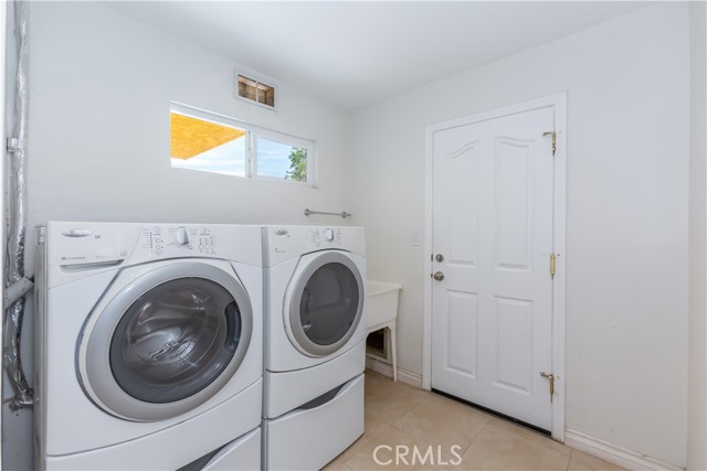 Downstairs Laundry Room and Access to Garage