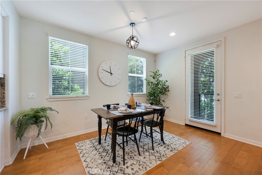 The Dining Room is spacious and has plenty of natural light and stunning views of the surrounding trees!