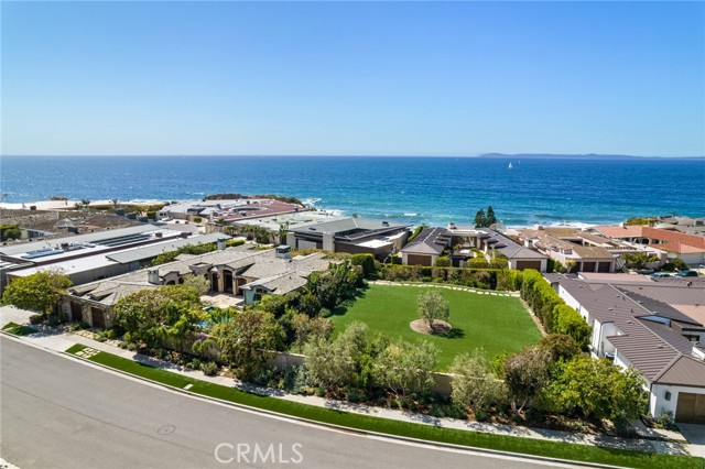 Extraordinary lot currently used as a park and garden setting for the contiguous property at 4601 Camden Drive. Landscaped with mature rose gardens, citrus, olive and melaleuca trees. Magnifically stunning views of ocean, Catalina, and Newport jetty. An opportunity to build on one of the communities most desirable streets or to purchase both 4539 Camden Drive and 4601 Camden Drive (6,857 square foot home) totaling 22,357 square feet of land for $22,990,000. AN OPPORTUNITY THAT CANNOT BE MISSED.Extraordinary lot currently used as a park and garden setting for the contiguous property at 4601 Camden Drive. Landscaped with mature rose gardens, citrus, olive and melaleuca trees. Magnifically stunning views of ocean, Catalina, and Newport jetty. An opportunity to build on one of the communities most desirable streets or to purchase both 4539 Camden Drive and 4601 Camden Drive (6,857 square foot home) totaling 22,357 square feet of land for $22,990,000. AN OPPORTUNITY THAT CANNOT BE MISSED.