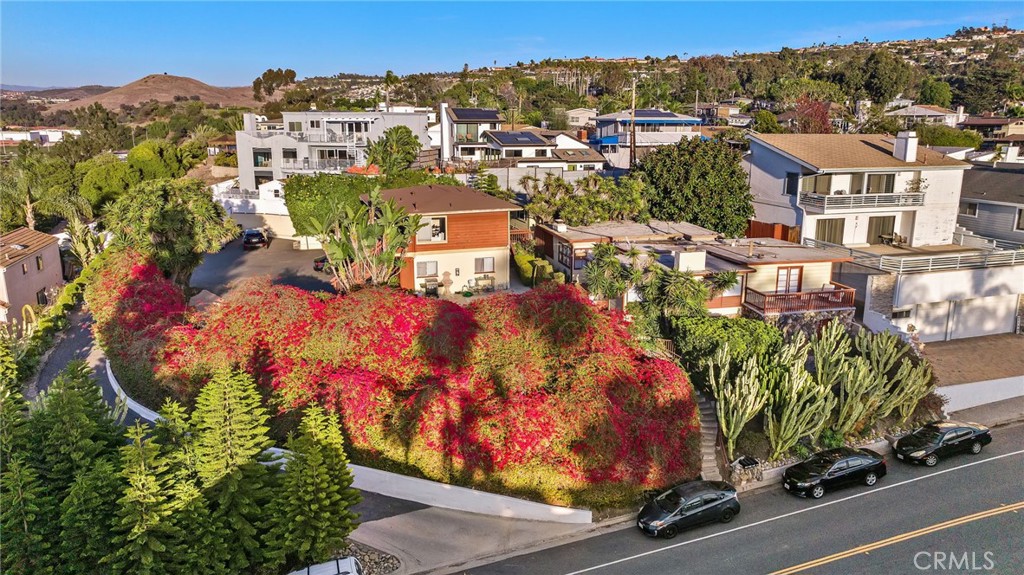 135/137/139 Avenida Sierra | Located on the ocean side of the 5 freeway in an established San Clemente neighborhood, this multi-unit income property could be the opportunity of a lifetime. Set on three separate parcels in close proximity to local beaches, parks, the Metrolink and many shopping/dining options, the property includes approximately 17,947 square feet and five units. An ocean view is available from the upper unit and the potential exists to build a new structure up from the spacious parking lot to capitalize on panoramic views of the ocean, city lights and hillsides. Currently, the property grosses over $10,200/month; 4 of the units are rented and records are available from the owner. An additional ADU could be upfitted to receive a permit and potentially bring another income stream totaling around $1,500/month. A 3-car garage and shared laundry add to the current investment value and versatility. With the potential to subdivide and build three single family homes, the property could deliver a substantial return on investment. The options are endless: live in the upper unit and enjoy the ocean breeze while renting the others, create a family compound, realize a 1031 Exchange to avoid capital gains or purchase solely as an investment and avoid the stress/fluctuations of the financial markets. Considering the premium location and the idea that the demand for Southern California real estate is unlikely to abate, the time to act is now. With the potential for appreciation and a current income stream, this versatile property could be a chance to build a legacy spanning multiple generations.