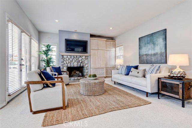Wood/gas fireplace in family room