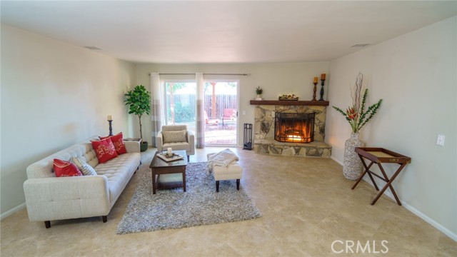 Spacious Living Room Opens to Patio