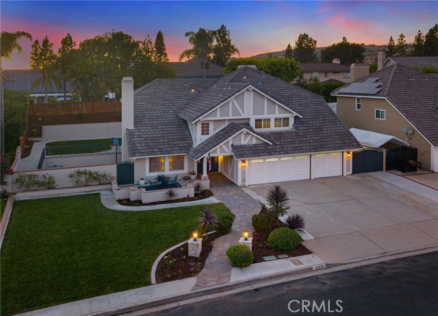 One of the Best Locations in All of Yorba Linda ... Near the End of a Small, Flat Cul-De-Sac Street, with Direct Access to Miles of Horse & Walking Trails, and Assigned to Top-Rated Schools! Built by Warmington, this Spacious 3,010-SqFt Home on a 10,000+ SqFt Lot Features 4 Bedrooms + an Office/Craft Room & 2.5 Bathrooms - Tremendous Curb Appeal with All Newer Hardscape & Landscape, Including a Fenced Front Yard Patio Area & Freshly Painted Exterior - Beveled Glass Front Door Opens to Handsome Hardwood Flooring and Formal Living Room with High Vaulted & Beamed Ceiling and Charming Brick Fireplace - Formal Dining Room - Large Chef's Kitchen Features White Cabinetry with Pull-Out Shelves, Corian Countertops, Recessed Lighting & Newer Appliances - Breakfast Eating Nook - Kitchen is Open to Family Great Room with Impressive Brick Fireplace - Generous Primary Suite has a Romantic Fireplace, Two Walk-In Closets, and Two Sets of French Doors Leading to Private Balcony Deck - Primary Bathroom Offers Dual Vanities, Soaking Tub & Separate Shower - 3 Additional Good-Sized Bedrooms, Plus an Office/Craft/Storage Room for all your Extra Needs! Convenient Inside Laundry Room with Sink - Attached 3-Car Garage, Plus Bonus Workshop Space - Culligan Soft Water System, with Reverse Osmosis System at Kitchen Sink - Ultra-Quiet Airscape Whole House Fan - Private & Peaceful Low-Maintenance Backyard has Solid Covered Patio with Lighting, Grass Area, & All Newly Poured Concrete, with Easy Ramped Access to Lower Level Sport Court - Relax in the Above Ground Spa or Sit by the Gas Fire Pit & Enjoy the Outdoors - No Mello Roos Tax – No HOA Dues - Award-Winning Placentia-Yorba Linda School District, Zoned for Fairmont Elementary School, Bernardo Yorba Middle School (soon to become The Orange County School of Computer Science, the first charter school within the district’s boundaries) & Yorba Linda High School