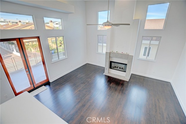 VIEW OF LIVING ROOM FROM LOFT LEVEL