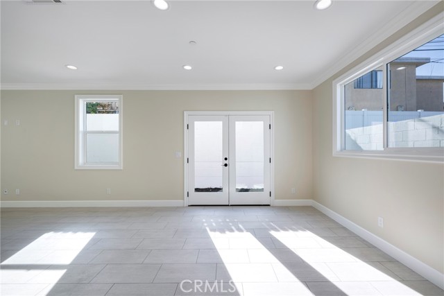 Dining area has recessed lights & window to the side yard.