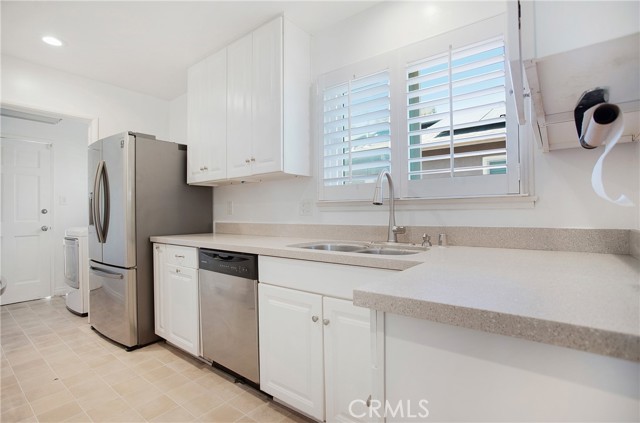 Updated kitchen has quartz countertops