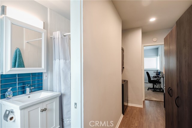 Rear Unit Upstairs Hallway & A Peek Into Upstairs Bath