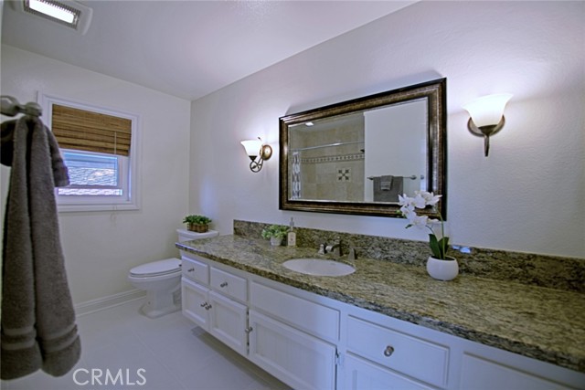 Remodeled guest bath with tub and shower