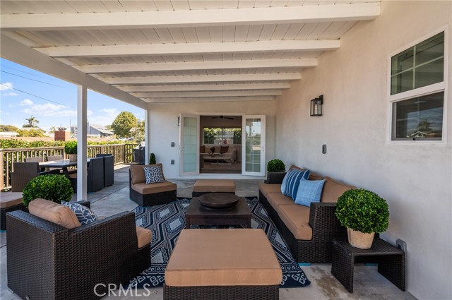 Covered patio off the living room perfect for indoor/outdoor entertaining.