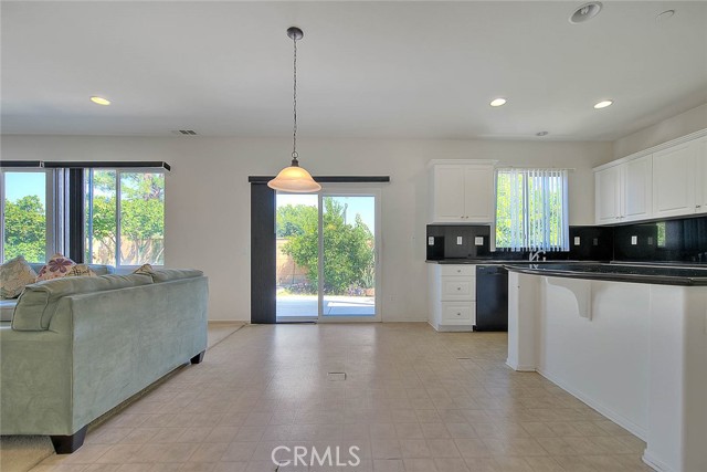 Breakfast nook area and bar top dining space