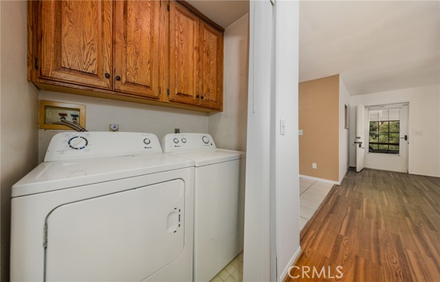 Laundry Area with Cabinets