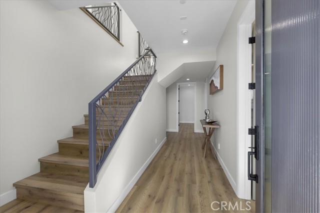 Front door entry hall to 3 bedrooms
