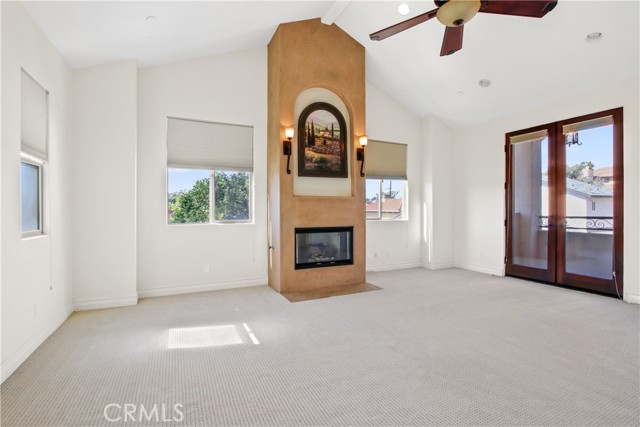 En-suite with a fireplace and Juliette's balcony.