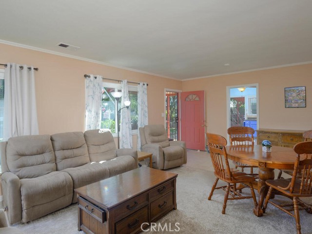 Entry, Living room and Dining area view