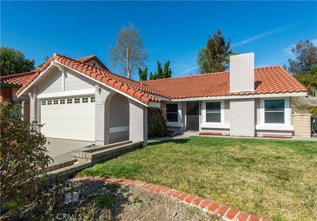 Welcome HOME to 17137 Canvas Street! This charming single-story home features 4 spacious bedrooms and 2 bathrooms, offering comfort and style throughout. With soaring high ceilings and a cozy fireplace in the living room, this home provides a warm, inviting atmosphere for family and guests. The kitchen is a chef's dream, equipped with sleek stainless-steel appliances, perfect for preparing meals with ease. The home has been freshly painted on the exterior and interior. The bathroom has been tastefully renovated. The primary bedroom has a large window with a view of the large backyard and the majestic mountains. The perfect place to wake up and watch the sunrise. Step outside to enjoy a breathtaking mountain view, and take advantage of the large, private backyard – ideal for outdoor entertaining, gardening, or simply unwinding in peace. Washer and Dryer are included. Conveniently located near shopping, restaurants and the 14 freeway. Don't miss the opportunity to make this beautiful property your new home! Welcome to 17137 Canvas Street!