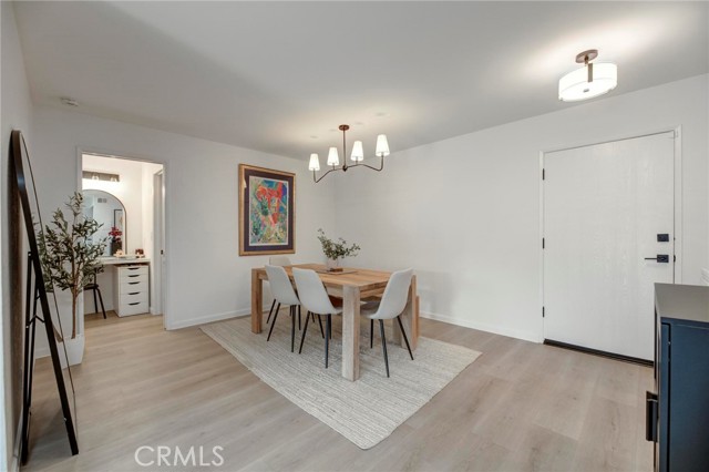 dining area, with entry door on the right