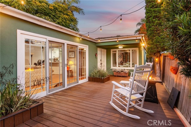 Entryway and side outdoor seating area