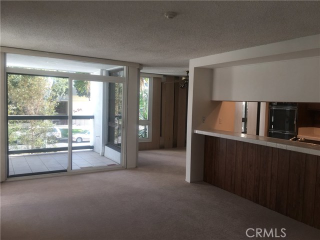 Breakfast Bar and Living area with the Front Patio!