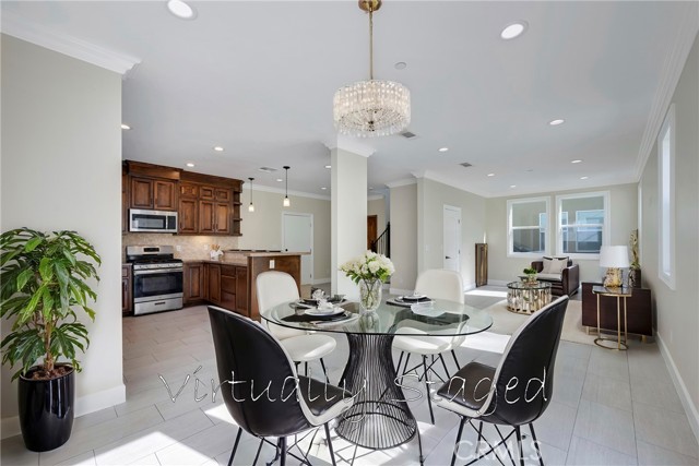 Virtually staged dining room & living room.