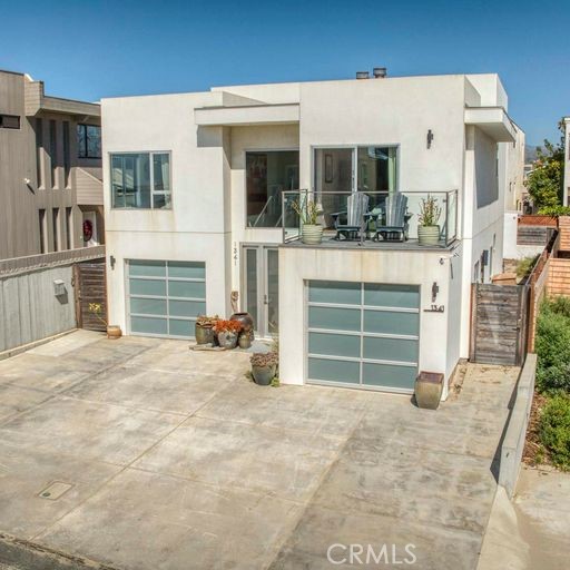 Wake up to the sound of the waves crashing on the beach, a view of the sail boats and dolphins playing in the ocean from this stunning newly remodeled modern home on one of the most sought after streets in Ventura. This 4 bedroom 3 bath home features beautiful ocean views, high ceilings an abundance of light throughout, open living spaces with cozy fireplaces perfect for entertaining or cuddling up on a cool beach night, a seperate kitchenette down stairs, and a large rooftop deck with 360* views of Ventura. Moments away from the beach, local shops and restaurants, this offering is a rare opportunity to own a turn key home this close to the sand.