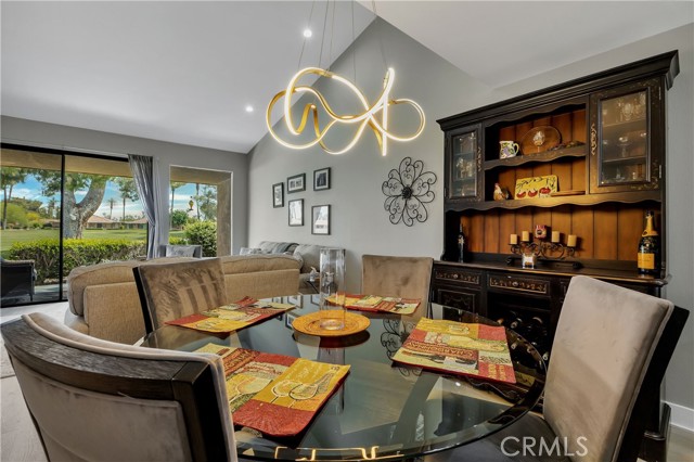 Dining room with contemporary light fixture.