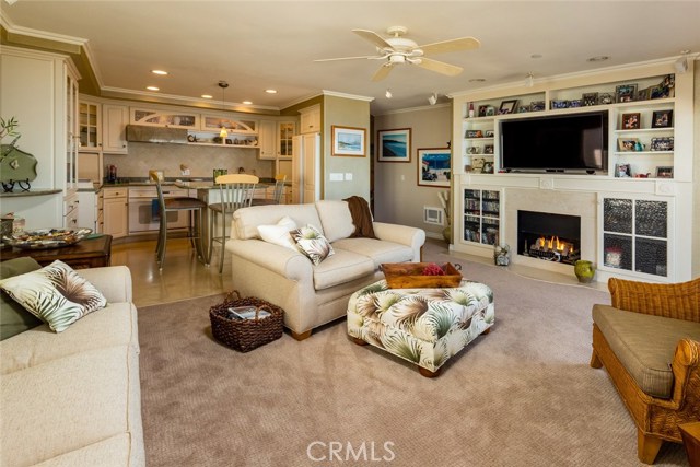 Limestone Fireplace and Large Entertainment Center